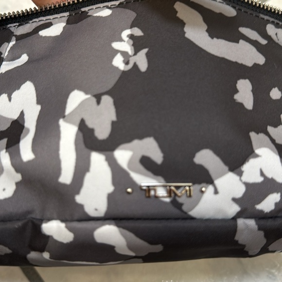 Tumi. New without tags. Endless pockets. - Picture 2 of 10